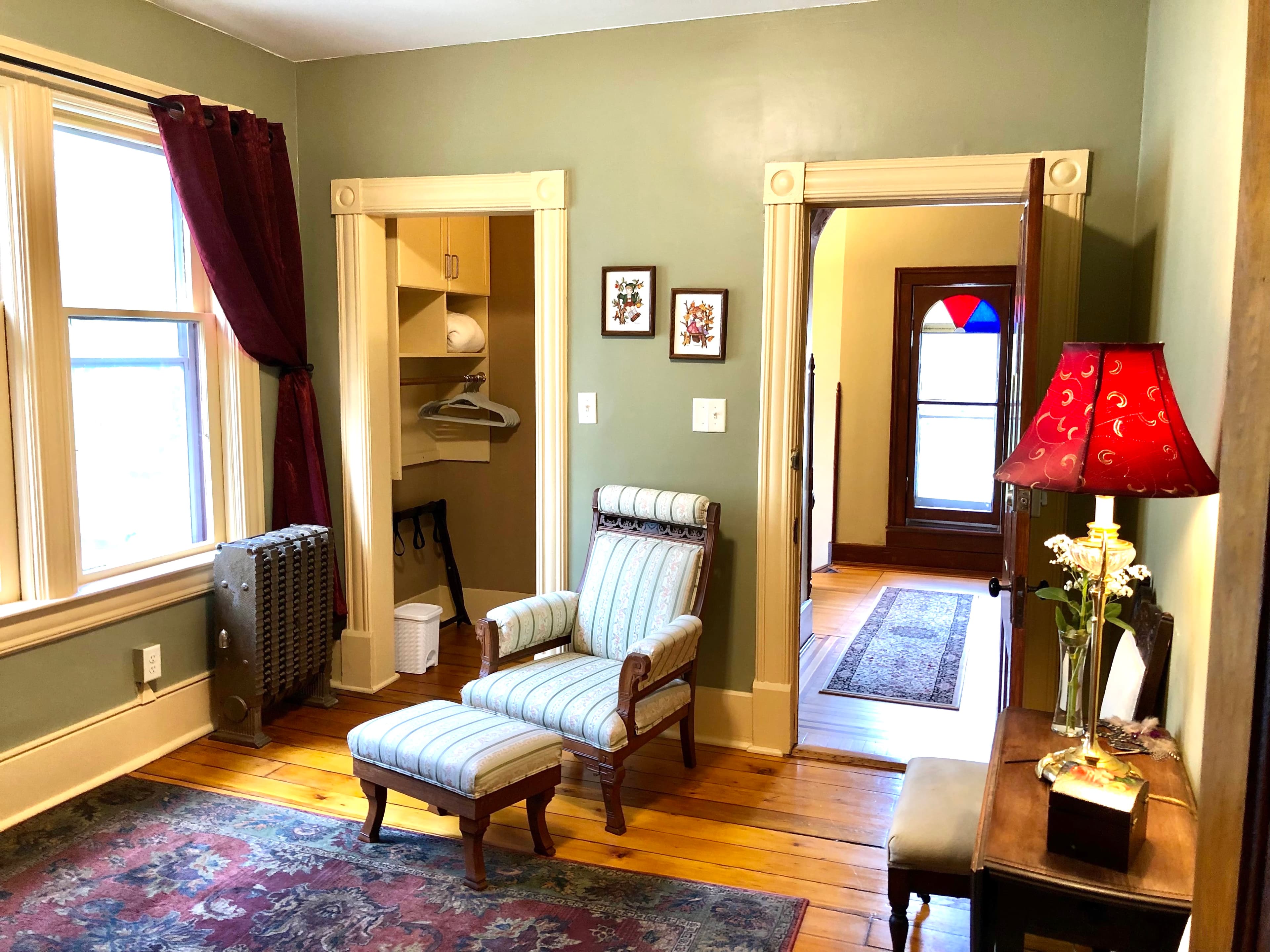Sitting Room with Full-Size pull down Murphy BedSitting Room with Full-Size pull down Murphy Bed. Table and 2 Chairs, Lounge Chair, Closet with Hangers, Dressor, MinFridge and Microwave